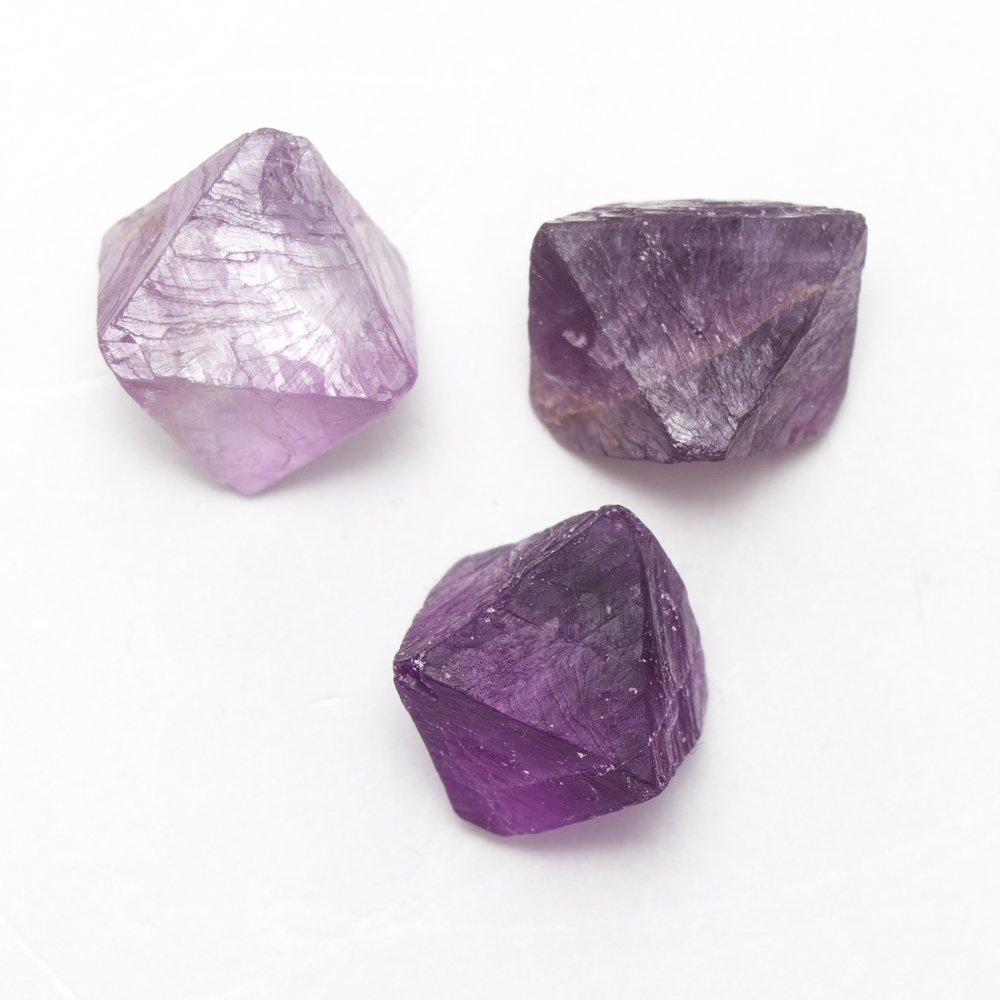 purple fluorite octahedrons small 75diam | Crystal Life